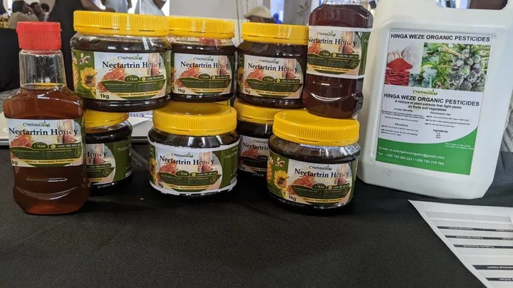 Nectartrin Honey jars beside a HINGA WEZE container