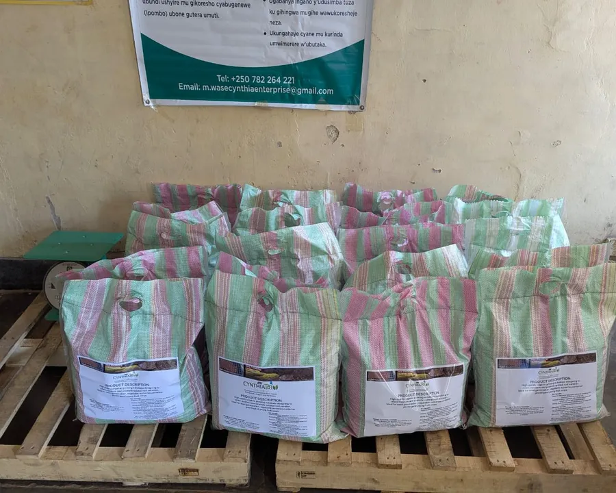 Bags of CYNTHIATRIN organic growing medium stacked on pallets
